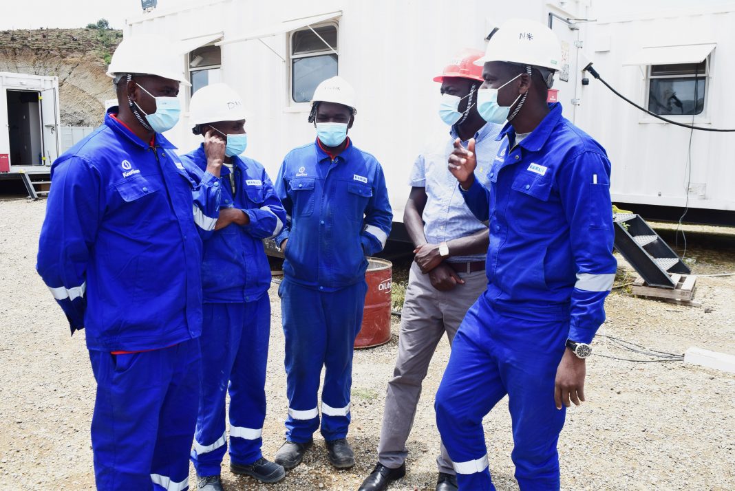 KenGen Team Project Engineer, Nesta Nyakiti, sharing a light moment with his drilling crew at the Ethiopian based EEP project currently under implementation in Aluto Langano Ethiopia