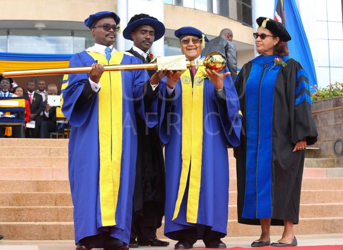 USIU VC Installation 2016 Outgoing Vice Chancellor Prof. Paul T. Zeleza (left) receiving the university mace from Chancellor Dr Manu Chandaria (second right) in 2016. Looking on is the former Chair of the Board of Trustees Mr. Linus Gitahi (second left) and former Vice Chancellor Prof. Freida A. Brown (right) who returns for a 9-month stint.