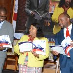 Serianu Chief Executive Officer (left), Dr. Catherine Ngahu Executive Chairman SBO Research and Serianu Chief Operating Officer Joseph Mathenge peruse the newly released 2020/ 2021 Sacco Technology Report.