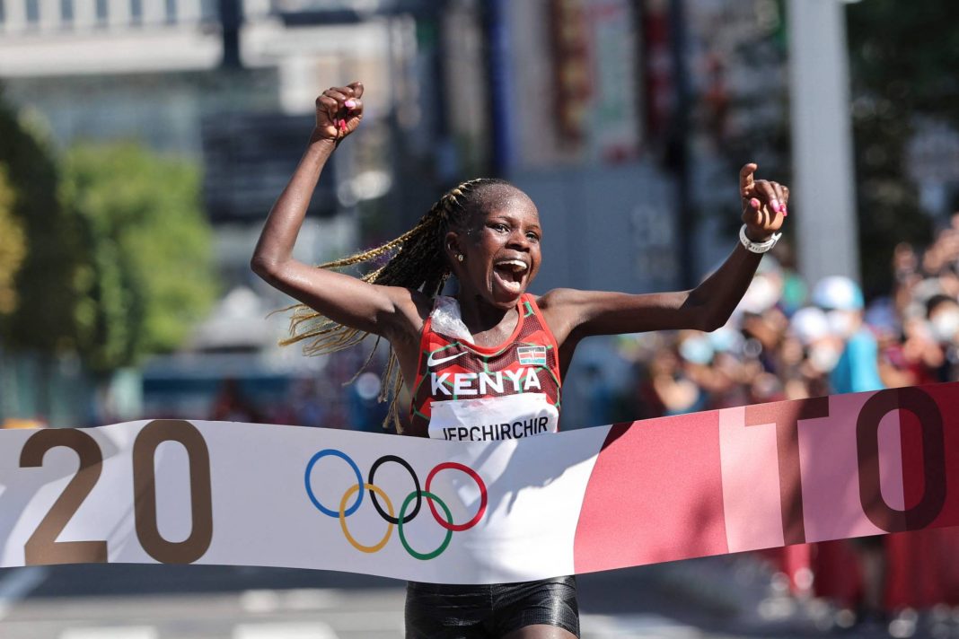 Kenya's Peres Jepchirchir wins the women's marathon final during the Tokyo 2020 Olympic Games in Sapporo on August 7, 2021. (Photo by Giuseppe CACACE / AFP)