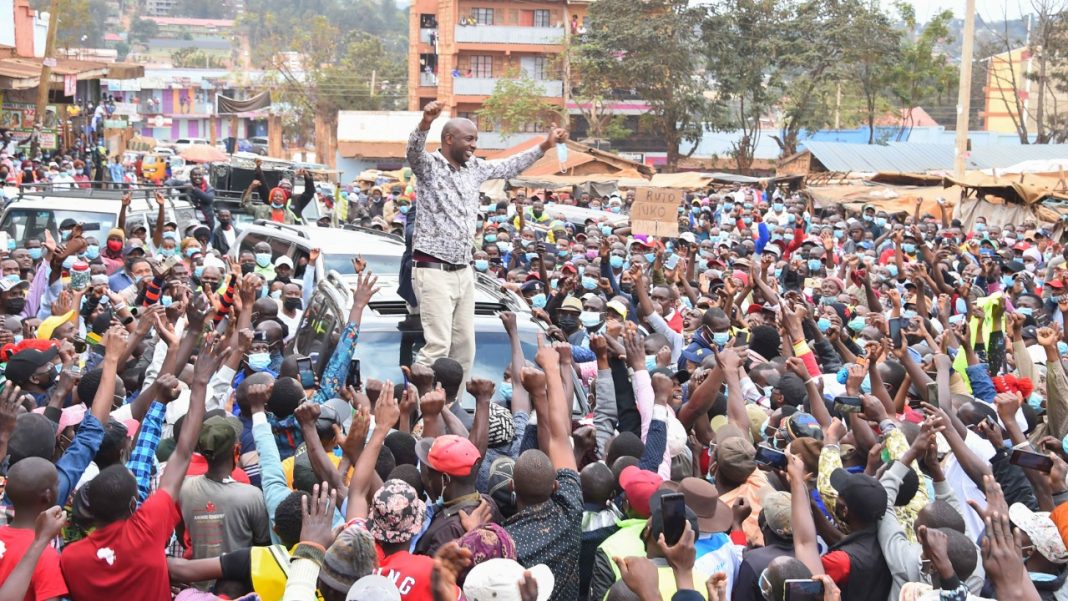 Murang'a Senator Irungu Kang'ata interacts with the crowd at a roadside rally on September , 2021 when he accompanied Deputy President William Ruto on a trip to Nyeri County. Ahead of the polls in 2022, heightened political activity has been witnessed in the country. [Photo/ @WilliamsRuto]