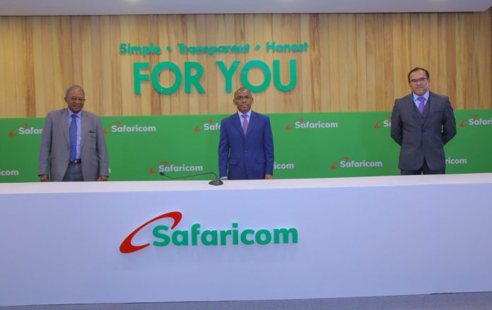 Safaricom CEO Peter Ndegwa (centre) with flanked by former Chairman Nicholas Ng'ang'a and former CEO Sateesh Kamath. Safaricom executives are among the most well-compensated in the region.