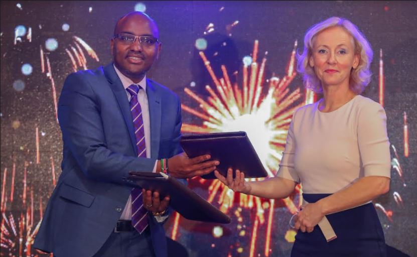 NBK Managing Director, Paul Russo (Left) and Aqua for All Managing Director Ms. Josien Sluijs (Right) sign an MOU during the launch of KShs.5B Water, Sanitation and Hygiene Financing Program.