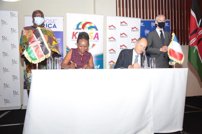 KEPSA CEO Carole Kariuki and MEDEF CEO Philippe Gautier signing an MOU during a business forum with a business delegation from France at Movenpick Hotel. Witnessing the signing is Cabinet Secretary for Industrialization, Trade and Enterprise Development Betty Maina (standing left) and France Minister Delegate for Foreign Trade and Economic Attractiveness Franck Riester (standing right)