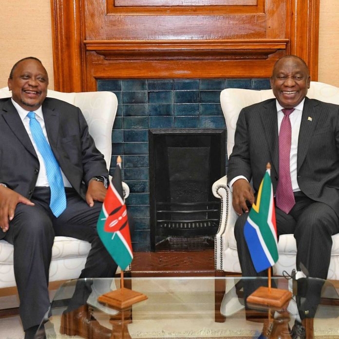 President Uhuru Kenyatta with South Africa President Cyril Ramaphosa. They committed to eliminating trade barriers between Kenya and South Africa. [Photo/ Courtesy]