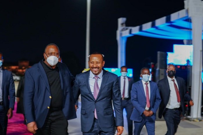 President Uhuru Kenyatta with Ethiopia Prime Minister Abiy Ahmed when he witnessed the issuance of a telco-operating license to a Safaricom-led consortium. [Photo/ Borkena]