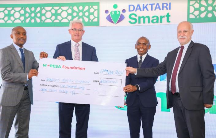 From left, Gertrude’s Children’s Hospital Dr. Robert Nyarango, Gertrude’s Children’s Foundation Chairman Les Baille, Chief Executive Officer, Safaricom PLC- Peter Ndegwa, M-PESA Foundation Chairman- Michael Joseph holding a dummy cheque worth KES 168 Million. This was during the launch of Daktari Smart telemedicine program at Gertrude’s Children’s Hospital in Muthaiga which is targeting over 32,000 children in Samburu, Homabay, Baringo and Lamu Counties. Daktari Smart is a three-year program that aims to use telemedicine technology to link and provide treatment to 32,400 children in six hard-to-reach counties in Kenya.