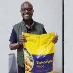 Twiga Foods Co-Founder and CEO poses with a bag of SokoYetu Rice, Twiga's first private label product launched in May. Among other things, part of the funds raised in the just concluded Series C will be allocated to low-cost manufactured food and non-food products under its brand.