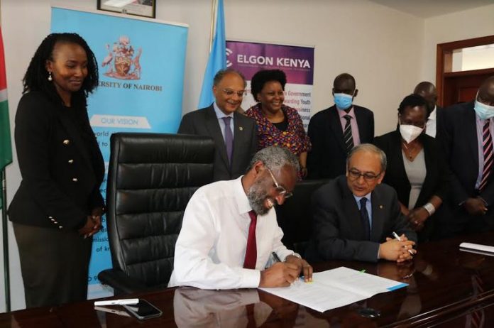 Elgon Kenya CEO Bimal Kantaria and University of Nairobi Vice Chancellor Prof Stephen Kiama during the signing of an MOU paving way for the construction of the Agricultural Technology and Innovation Centre (ATIC) at the College of Agriculture and Veterinary Services, Upper Kabete Campus Nairobi.