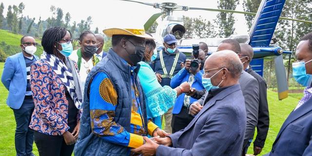 ODM leader Raila Odinga (l) with RMS owner SK Macharia at a thanksgiving concert hosted at his Murang'a home on July 27, 2021 following the increase of artists' share of Skiza revenues. [Photo/ Courtesy]