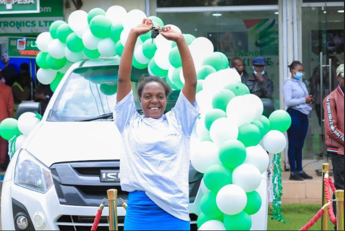 Margaret Njoroge, could not hide her happiness after being crowned Winner of Isuzu Dmax during the Lipa Na Mpesa Winners Promotion held in Machakos County.