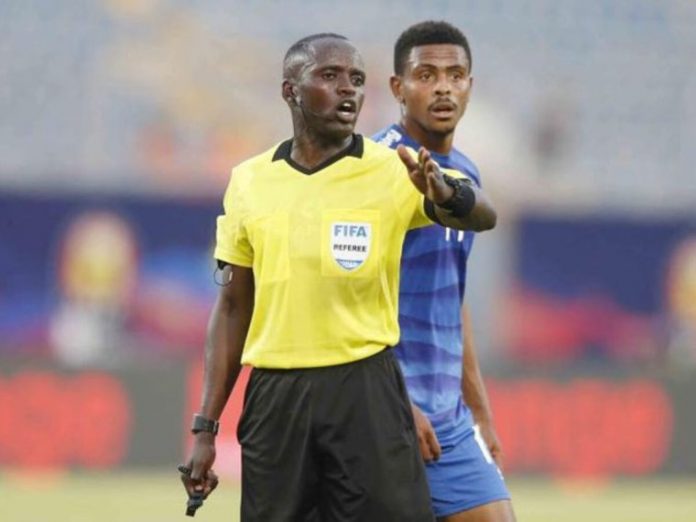 Peter Waweru Kamaku in action as the centre referee during Gabon's opening match vs Comoros at AFCON 2021 on January 10, 2022. It ended 1-0 for Gabon.
