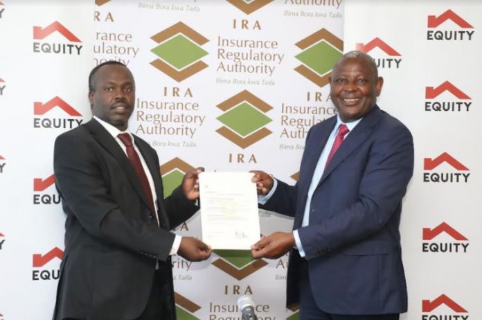 Equity Group Managing Director & CEO Dr. James Mwangi (right) receives the Equity Life Assurance (Kenya) Ltd operating license from @IRA Commissioner of Insurance Godfrey Kiptum (2nd left).