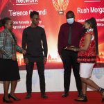 Lucy Mulili (left) presents certificates and trophies to the winners of the just concluded Huawei National ICT competition. [Photo/ Courtesy]