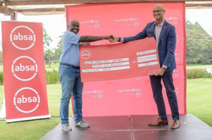 Absa Bank Managing Director Jeremy Awori hand the tournament sponsorship cheque to Kenya Open Golf Limited Tournament Director Patrick Obath during the Magical Kenya Open 2022 sponsorship announcement.