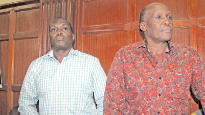 Stephen Mukuha (right) and George Gachwe in court in 2016. [Photo/ Courtesy]