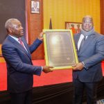 H.E Felix Tshishekedi, President of the Democratic Republic of Congo (right) receives a memento from Dr. James Mwangi Equity Group Managing Director and CEO (left) during a corporate dinner organized by Equity Group to celebrate the signing of the accession treaty by DRC after admission into the East African Community (EAC) and in furtherance of the Kenya-DRC Trade relations.