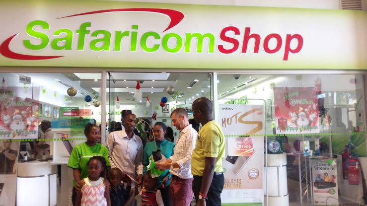 Customers outside a Safaricom shop. The push to have Kenyans register their SIM cards again is rubbing many the wrong way. [Photo/ Nyongesa Sande]