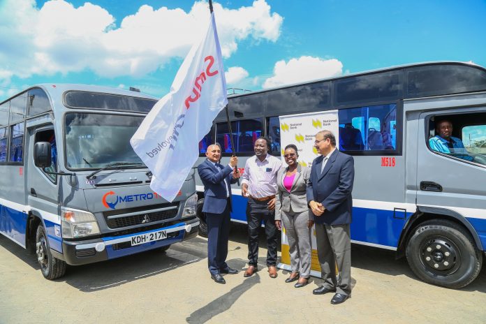From Left: Simba Corp Motors MD Naresh Leekh, Metro Trans Limited Director, Mr. Oscar Omurwa Rosana and NBK Retail Banking Director Carol Rutto during the handover of 80 buses to Metro Trans Limited From Left: Simba Corp Motors MD Naresh Leekh, Metro Trans Limited Director, Mr. Oscar Omurwa Rosana and NBK Retail Banking Director Carol Rutto during the handover of 80 buses to Metro Trans Limited