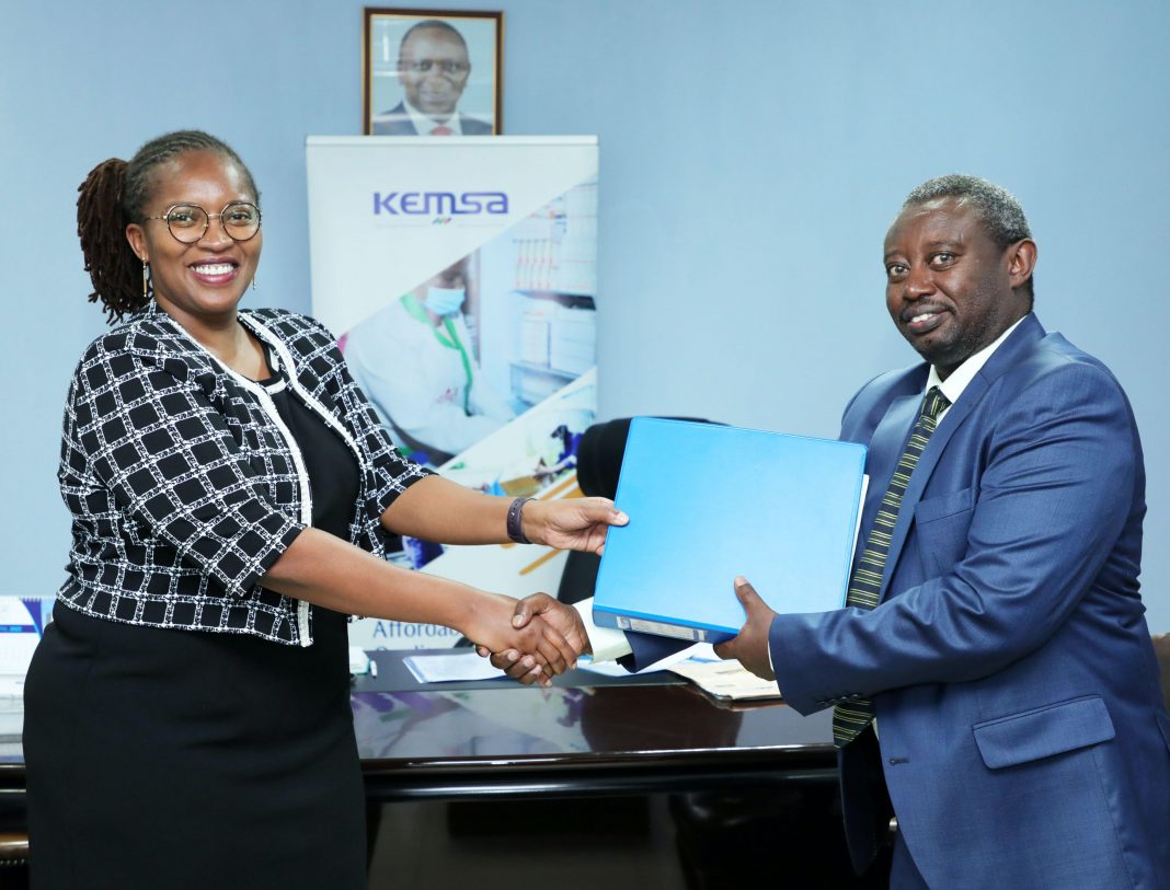 KEMSA Chief Executive Officer Terry Ramadhani receiving the instruments of office from immediate Acting CEO Mr John Kabuchu