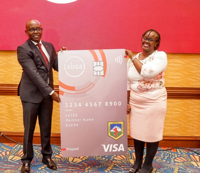 L to R - Absa Bank's Head of Premier Banking Simon Gachahi poses with Kenya Medical Association CEO Dr. Njoki Fernandes Absa Bank's Head of Premier Banking Simon Gachahi poses with Kenya Medical Association CEO Dr. Njoki Fernandes