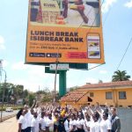 Kune staff including founder Robin Reecht (far right) pose with one of several billboards the company put up as it launched. [Photo/ Linkedin]
