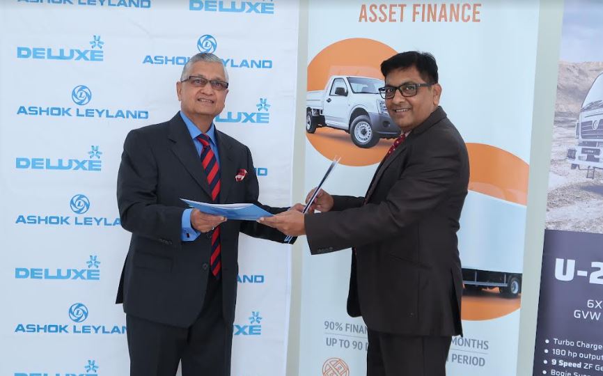 Ameet Shroff, Managing Director Deluxe Trucks & Buses E.A. Ltd and Vinay Rathi, Managing Director Bank of Baroda, Kenya during the the signing of a financing agreement between Deluxe Trucks and Bank of Baroda. Deluxe Trucks & Buses E.A. Ltd are the sole authorized distributors for the full range of Ashok Leyland Trucks and Buses