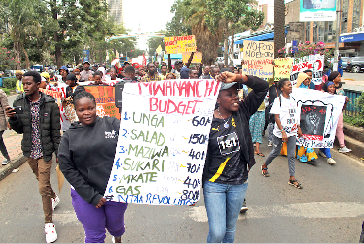 A recent protest dubbed 'Njaa Revolution' in the streets of Nairobi demanding lower food prices. The government intervention comes amid widespread public uproar over the cost of living. [Photo/ Andrew Kasuku]