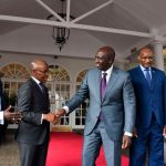 L-R: NCBA Group Managing Director John Gachora, Safaricom PLC CEO Peter Ndegwa, President William Ruto, Central Bank of Kenya (CBK) Governor Patrick Njoroge and KCB Group PLC Group CEO Paul Russo during a press briefing after a September event to announce lower charges on the Fuliza overdraft service. President William Ruto shakes the hand of Safaricom CEO Peter Ndegwa after meeting with the telco and banks executives over Fuliza charges review. [PHOTO | DIANA NGILA | NMG]