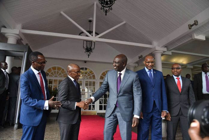 President William Ruto with the CEOs of Safaricom, NCBA and KCB as well as the CBK Governor at an event on September 28. [PHOTO | DIANA NGILA | NMG]