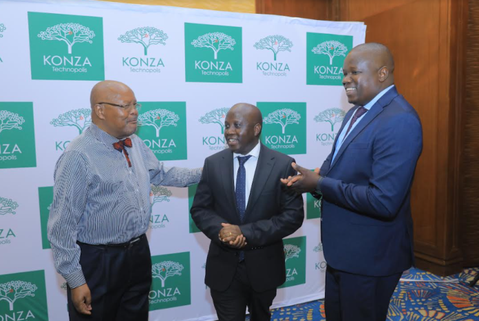 ICT & Digital Economy PS, Eng. John Tanui (c) with KoTDA Chairman, Arc. Reuben Mutiso (l) & Ag.CEO John Okwiri during the Financiers Forum event ICT & Digital Economy PS, Eng. John Tanui (c) with KoTDA Chairman, Arc. Reuben Mutiso (l) & Ag.CEO John Okwiri during the Financiers Forum event