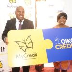 (L-R) MyCredit Managing Director Mr Wangaruro Mbira Receives Cheque From OikoCredit Regional Director Africa Region Caroline Mulwa during the signing agreement for ksh. 325 million from OikoCredit to MyCredit for onward lending to SMEs who are are doing trading business.