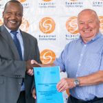 Superior Homes Kenya Managing Director Ian Henderson (R) and Northern Corridor Transit and Transport Coordination Authority (NCTTCA) Executive Secretary Justus Omae during the signing of a partnership that seeks to enhance road safety for long-distance transit drivers through the construction of roadside stations along the Northern Corridor.
