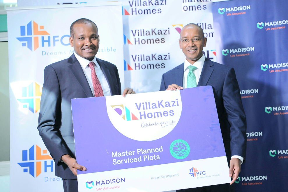 L - R HF Group CEO Robert Kibaara and Madison Life MD Githua Ngaruiya during the partnership signing ceremony