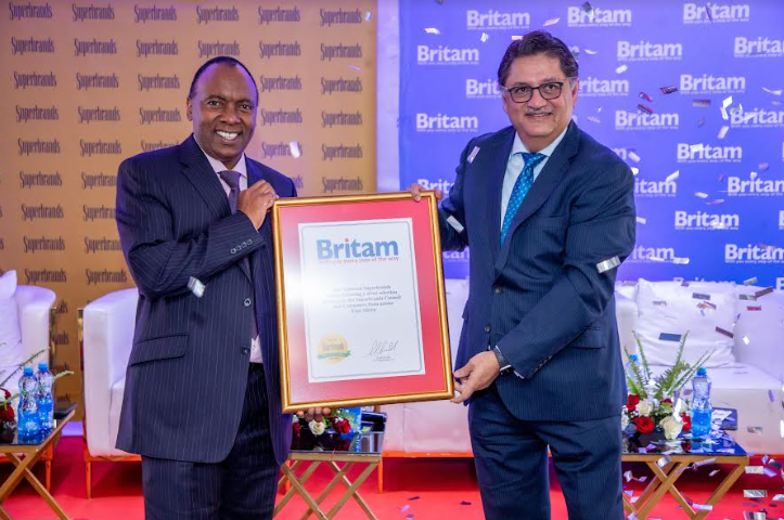 From Left: Britam Group CEO and GMD – Tom Gitogo receives the Superbrand seal of approval from Superbrands East Africa Program Director – Jawad Jaffer, after Britam Group was recognized as one of the top 50 performing brands in East Africa,