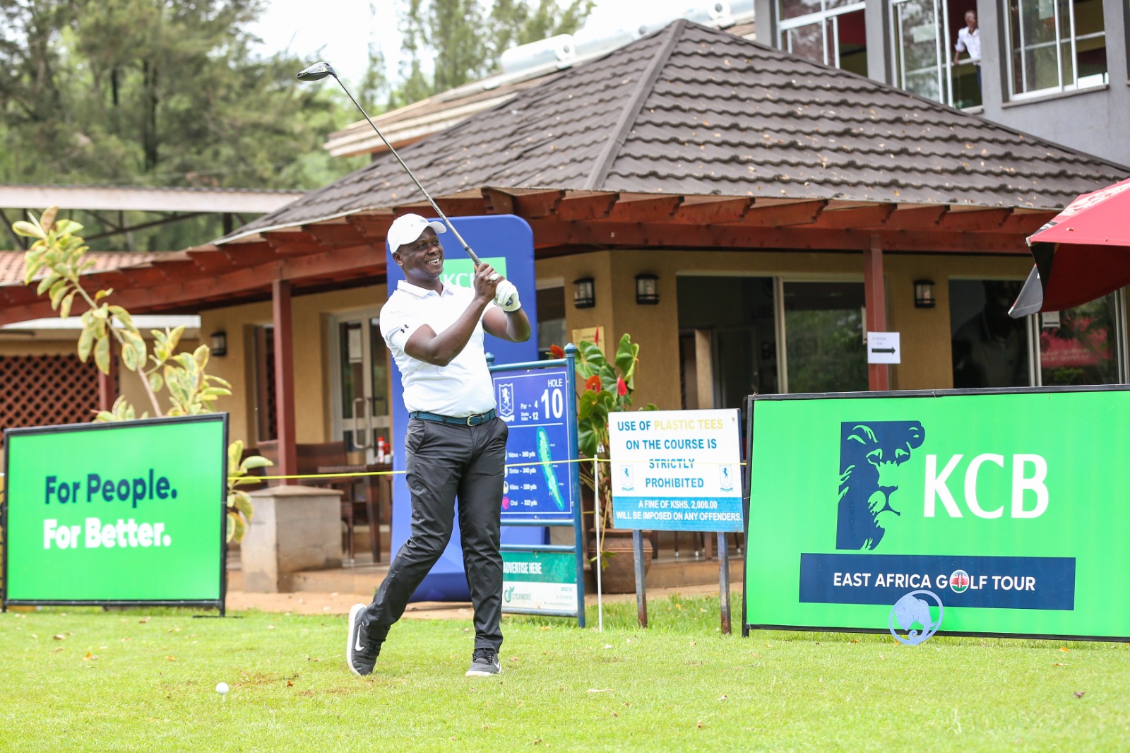 KCB Group Head of Human Resource Japeth Achola tees off during the launch of the 2023 KCB East Africa Golf Tour at the Royal Nairobi Golf Club.