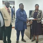 Kenya Plantation and Agricultural Workers Union General Secretary Francis Atwoli with Eastern Produce Kenya Officials Leah Kibii and Fancy Mosore following the CBA signing