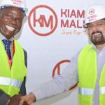 Bia Tosha founder and Kiambu Mall chairman Peter Burugu (left) pictured with a Choppies executive after a past function at the mall. [Photo/ Kamau Maichuhie]