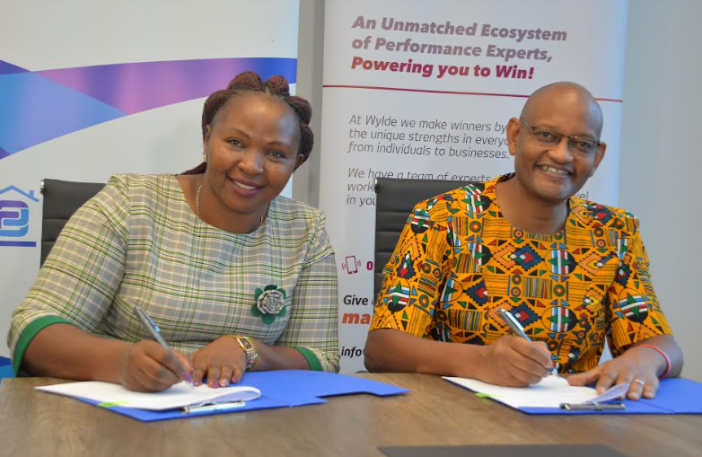 Family Bank Chief Retail Officer Phyllis Kimani & Wylde International Director Kiriinya Kithinji during the MOU signing of a partnership that will see them empower the Bank’s SMEs through capacity-building trainings.