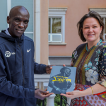 Image 2 from left Eliud Kipchoge Lindsey O'Brien Chief Marketing Officer at Mozilla