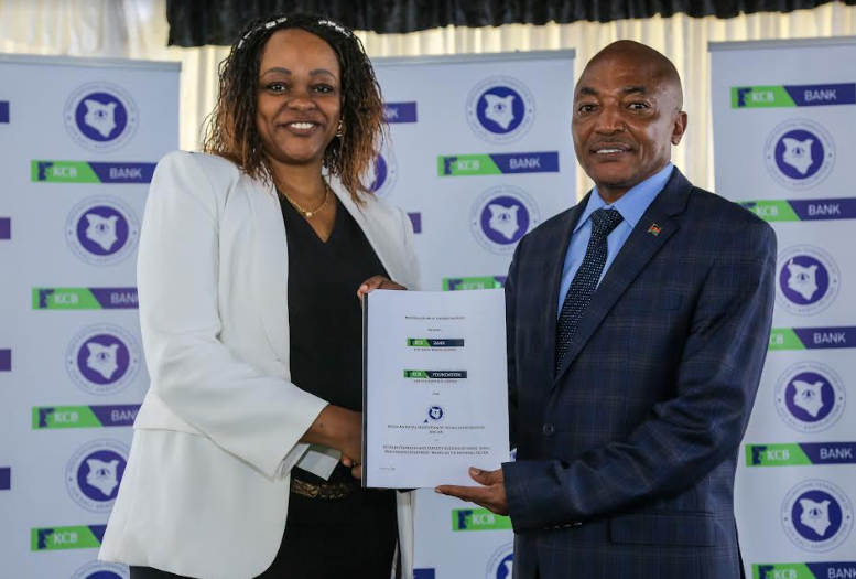 L:R: KCB Bank Kenya Director of Digital Financial Services Ms. Angela Mwirigi and the CEO of Kenya National Federation of Jua Kali Association Mr. Richard Muteti during MoU Signing Ceremony between KCB Bank and Kenya National Federation of Jua Kali Association to empower the Jua Kali sector.