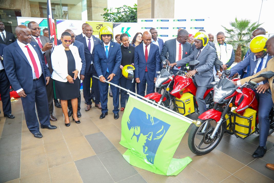 CB Group CEO, Paul Russo flags off the new electric motorbikes at Ole Sereni hotel. On the bikes are, Cabinet Secretary for Roads, Transport & Public Works, Hon. Onesmus Kipchumba Murkomen (second right) and Principal Secretary State Department for Investments Promotion- Ministry of Trade, Hon. Abubakar Hassan Abubakar. This was during the KCB and UNITAR launch of 100,000 Electric Motor Bikes Project launch.