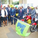 CB Group CEO, Paul Russo flags off the new electric motorbikes at Ole Sereni hotel. On the bikes are, Cabinet Secretary for Roads, Transport & Public Works, Hon. Onesmus Kipchumba Murkomen (second right) and Principal Secretary State Department for Investments Promotion- Ministry of Trade, Hon. Abubakar Hassan Abubakar. This was during the KCB and UNITAR launch of 100,000 Electric Motor Bikes Project launch.