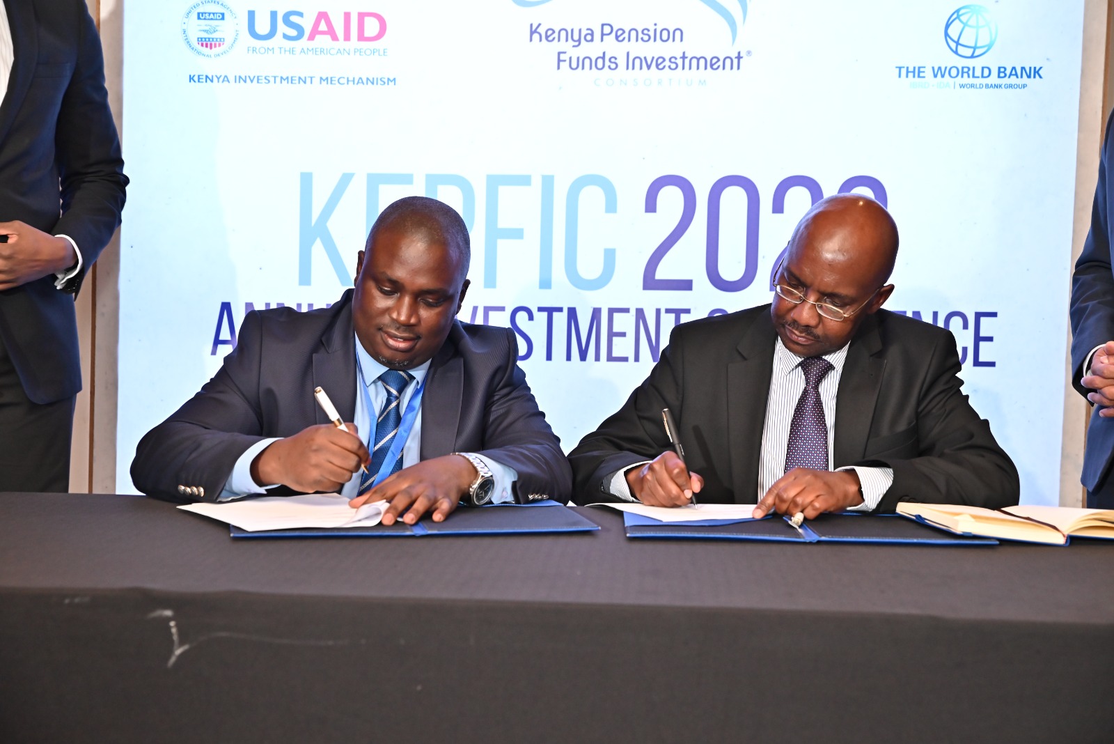 (L-R) Mr. Calvin Nyachoti Chairman, Kenya Pension Funds Investment Consortium (KEPFIC), and Mr. Patrick Kariuki, Chairman of the Fund Managers Association (FMA), sign an MOU to cooperate in boosting pension schemes investment in alternative assets on July 21st, 2023 in Nairobi.