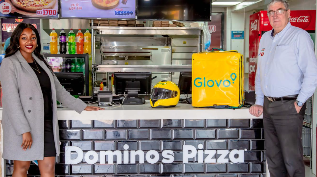 Ivy Maingi, Commercial Manager for Glovo Kenya and Peter Jones, Managing Director, Eat’N’Go Kenya celebrate signing a Memorandum of Understanding to kick off the partnership between Glovo and Domino’s Pizza.