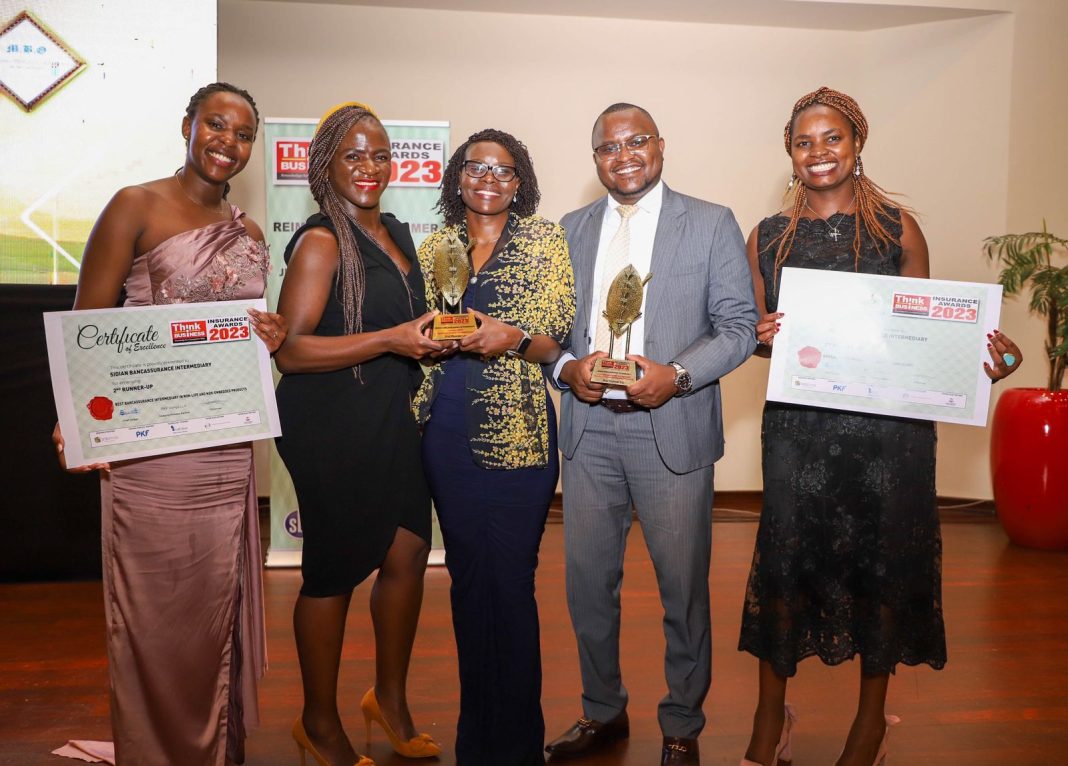 L-R: Edith Gaitho, Relationship Manager - Sidian Bancassurance Intermediary Limited, Abigael Opondo - Asst. Marketing Manager, Naomie Kemei, Senior Manager - Bancassurance, Paul Gitau, Business Support Manager - Sidian Bancassurance Intermediary Limited and Joy Gitau, Bancassurance Officer - Sidian Bancassurance Intermediary Limited at the Think Business Insurance Awards at Movenpick Hotel in Westlands.