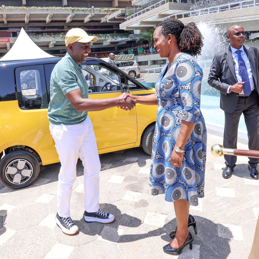 The original photo shows Ruto greeting Environment Cabinet Secretary Soipan Tuya.