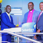 L-R Vitalis wekesa branch manager Kakamega ,Bishop Charles Asilutwa and Chege Thumbi CEO Sidian Bank at the launch of Sidian Bank in Kakamega County.