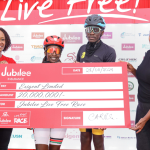 From L: Caroline Ndungu , Group Head , Group Head of Marketing and Corporate Communications, Cyclists and Loise Wachira Director and Founder of the Grand Nairobi Bike Race during announcement of the 3rd Edition of the Jubilee Live Free Race.