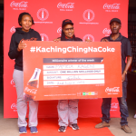 (L-R) Regional Trade Marketing Manager Nairobi, Coca- Cola Bottlers Kenya, Shilah Shitanda, Ksh 1Million winner Pamela Kageni from Nairobi and Area Sales Manager, Eastleigh District, Coca-Cola Bottlers Kenya, Ben Momanyi during the presentation of a cheque to one of the winners of the Kachingching na Coke campaign. [Photo/Courtesy]